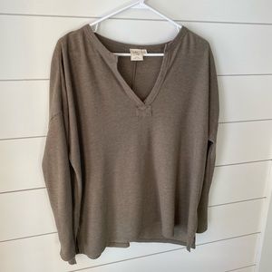 Never been worn White Crow top. In Olive green. Has a side slip.